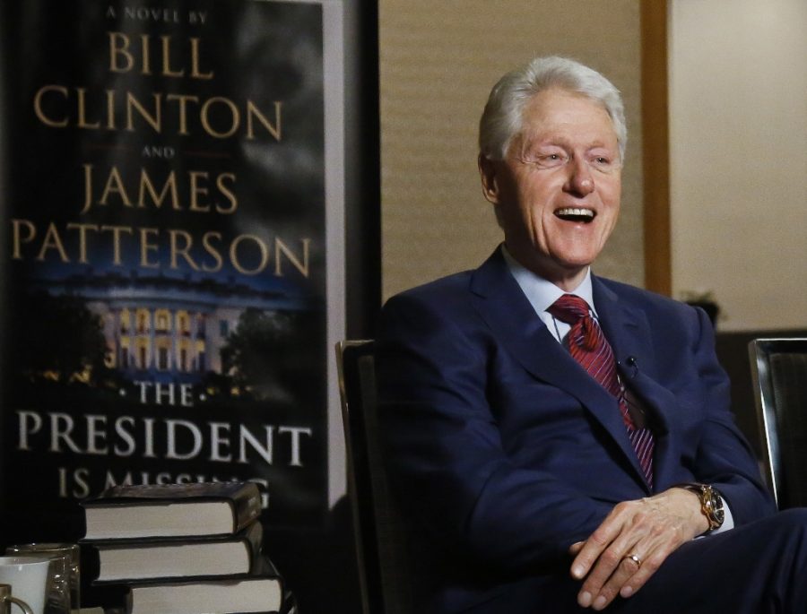In this Monday, May 21, 2018, photo, former President Bill Clinton speaks during an interview about a novel he wrote with James Patterson, "The President is Missing," in New York. (AP Photo/Bebeto Matthews)